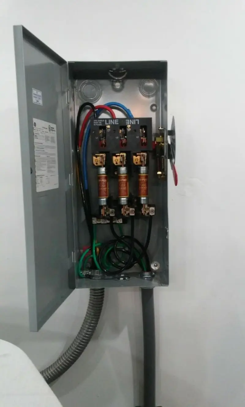 Three-phase disconnect switch installed for Smoke Detector Installation in Clay Center